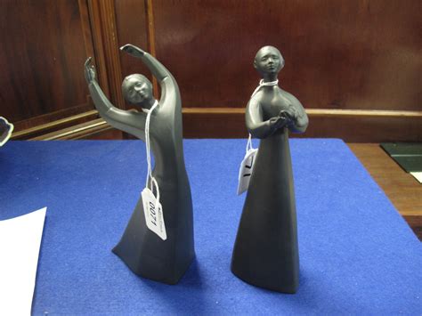 royal doulton black figurines